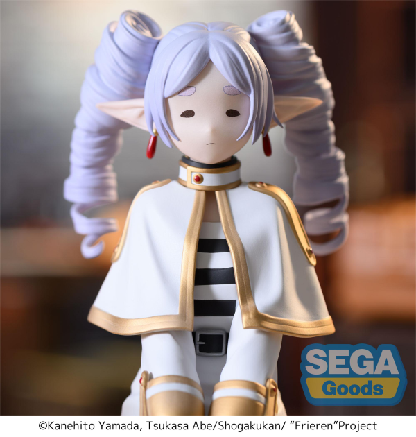 SEGA PM Perching Figure Frieren in seated pose with ringlet hairstyle, white mage outfit — official Frieren: Beyond Journey's End prize figure collectible