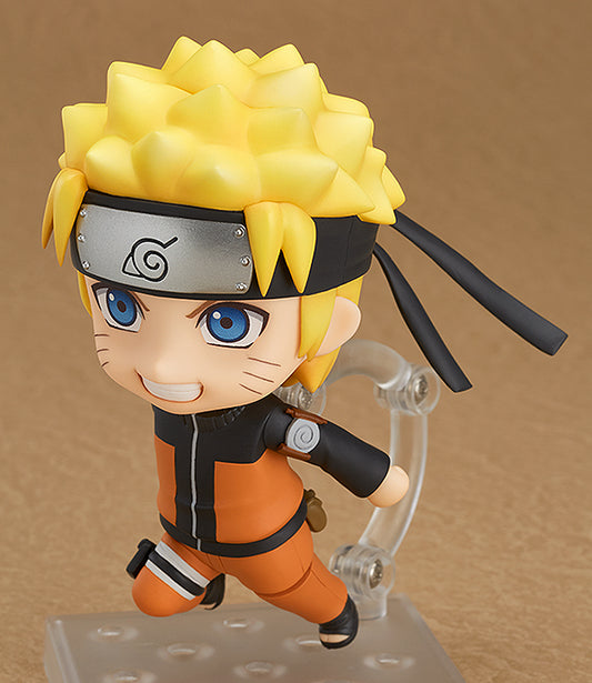 Good Smile Company Nendoroid #682 Naruto Uzumaki figure — orange jumpsuit, running pose, Konoha headband. Official Naruto Shippuden GSC collectible action figure.