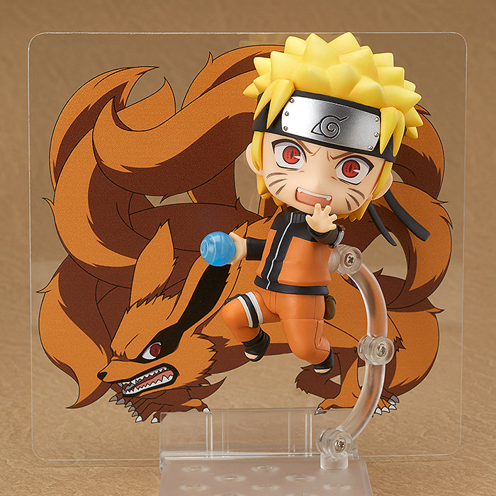 Good Smile Company Nendoroid #682 Naruto Uzumaki figure — orange jumpsuit, running pose, Konoha headband. Official Naruto Shippuden GSC collectible action figure.