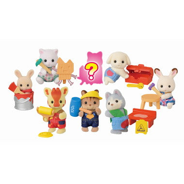 Set of colorful animal figurines with various accessories on a white background