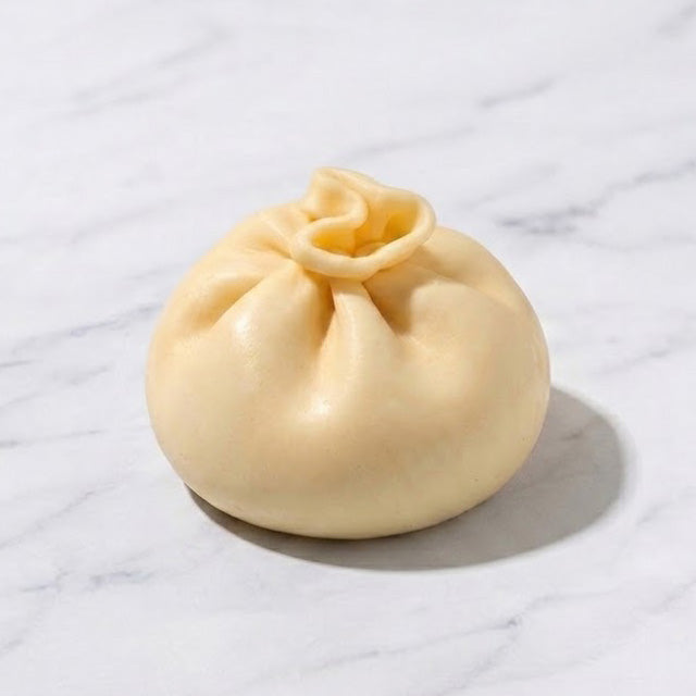 Giant Cheese Dumpling Dim Sum Crunch Slime -- satisfying crunchy giant cheese-filled dumpling shaped slime stress relief sensory toy kawaii