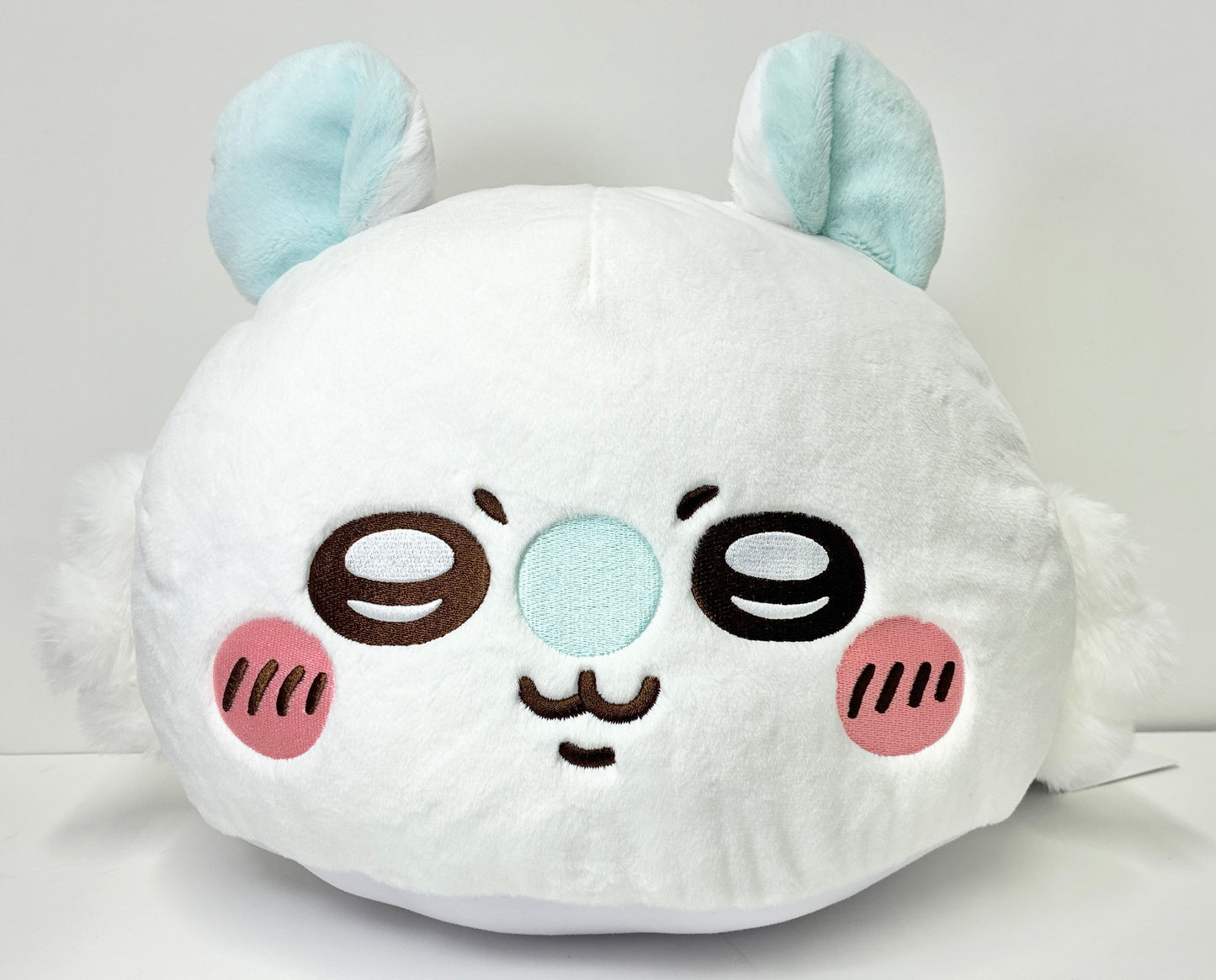 Chiikawa Premium Dome Cushion Momonga — white hemisphere cushion with teal ears and embroidered Momonga face, official Sega Prize collectible