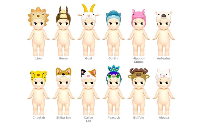 Row of animal-themed baby dolls with corresponding animal names on a white background