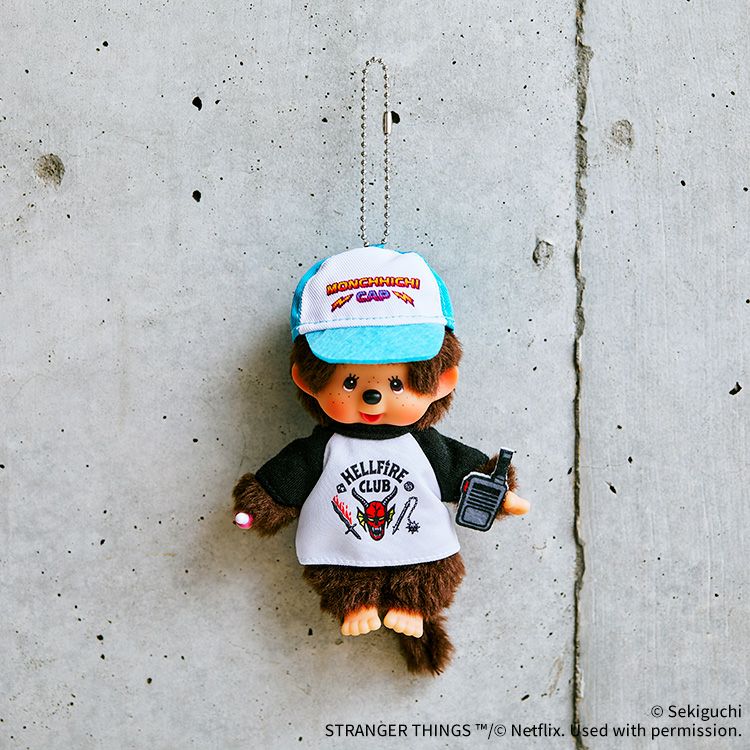 Monchhichi x Stranger Things Hellfire Club Mascot Keychain -- Dustin-inspired Monchhichi with tee and walkie-talkie, official Sekiguchi Netflix collab collectible gift