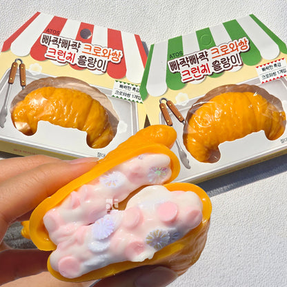 Crunchy Croissant Slime -- satisfying crispy crunchy croissant shaped slime stress relief sensory toy kawaii