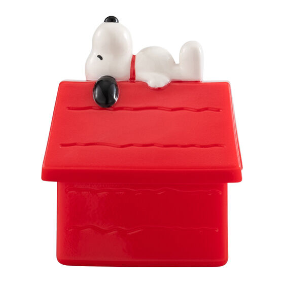 Red doghouse with a white dog figure on top against a white background