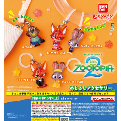 Zootopia 2 Mejirushi charms shown attached to an umbrella handle and a plastic bottle using the clear silicone ring.