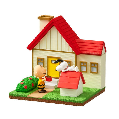 Toy house with a red roof and a doghouse, featuring two characters in front.