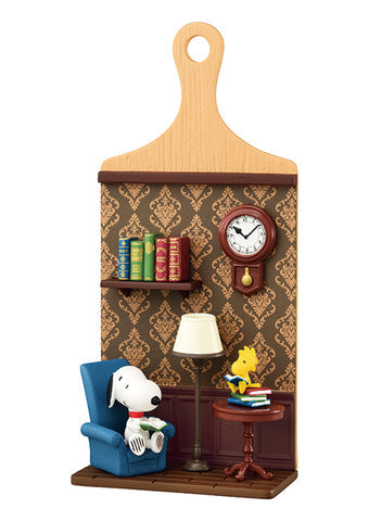 Decorative wall shelf with Snoopy and Woodstock reading a book, clock, and books on a patterned background.