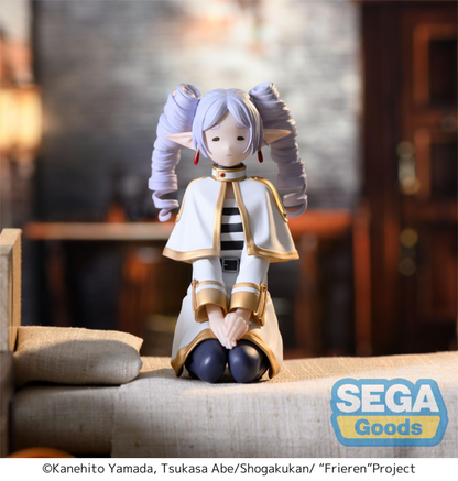 SEGA PM Perching Figure Frieren in seated pose with ringlet hairstyle, white mage outfit — official Frieren: Beyond Journey's End prize figure collectible
