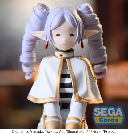 SEGA PM Perching Figure Frieren in seated pose with ringlet hairstyle, white mage outfit — official Frieren: Beyond Journey's End prize figure collectible