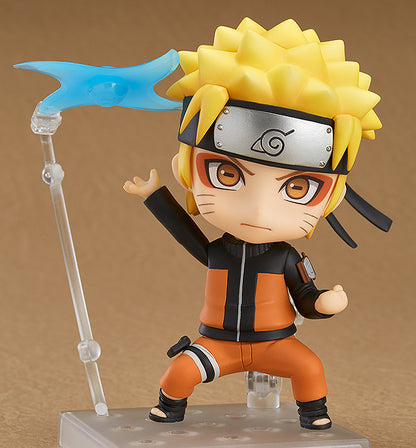 Good Smile Company Nendoroid #682 Naruto Uzumaki figure — orange jumpsuit, running pose, Konoha headband. Official Naruto Shippuden GSC collectible action figure.