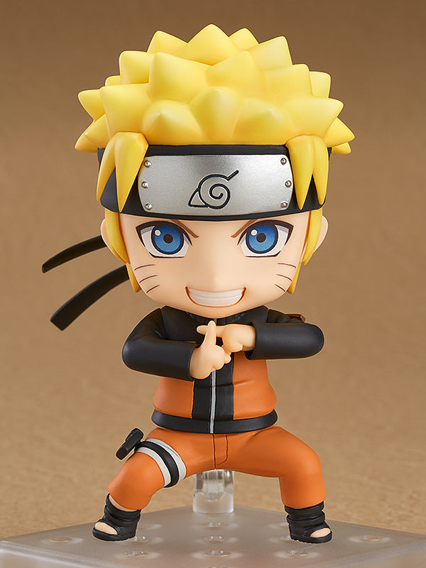 Good Smile Company Nendoroid #682 Naruto Uzumaki figure — orange jumpsuit, running pose, Konoha headband. Official Naruto Shippuden GSC collectible action figure.