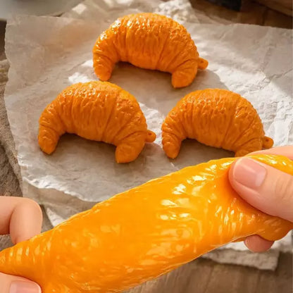 Crunchy Croissant Slime -- satisfying crispy crunchy croissant shaped slime stress relief sensory toy kawaii