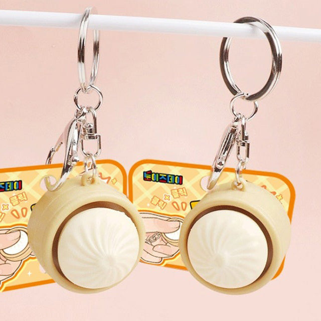 Dumpling Clicky Bubble Keychain — pop-it style dumpling shaped clicky bag charm, kawaii novelty keychain