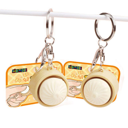 Dumpling Clicky Bubble Keychain — pop-it style dumpling shaped clicky bag charm, kawaii novelty keychain