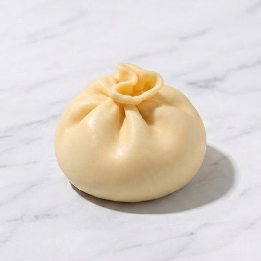 Giant Cheese Dumpling Dim Sum Crunch Slime -- satisfying crunchy giant cheese-filled dumpling shaped slime stress relief sensory toy kawaii