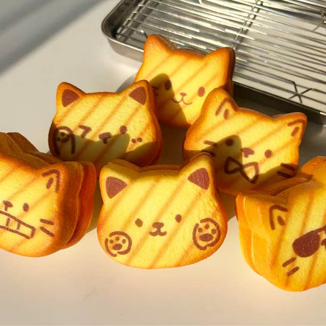 Nyang Nyang Cat Bread Squishy — slow-rising foam squishy cat bread stress relief toy, kawaii desk toy gift
