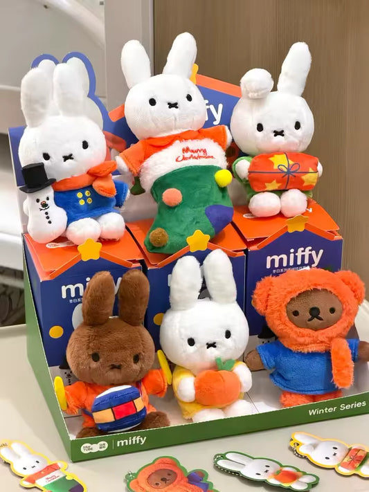 Miffy Winter Series Blind Box plush figures collection featuring Miffy in various holiday outfits like snowman, Christmas stocking, and winter coats.