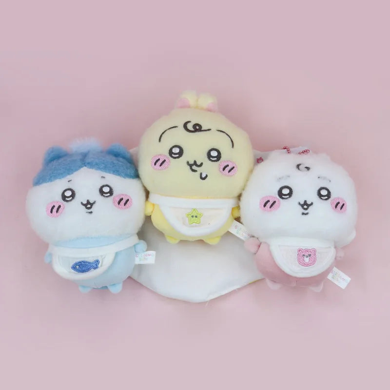 Three cartoon-style plush toys on a pink background