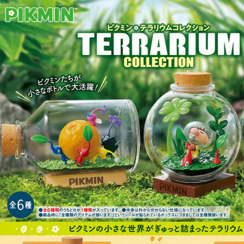 Pikmin terrarium collection with glass containers and miniature figures on a grassy background.