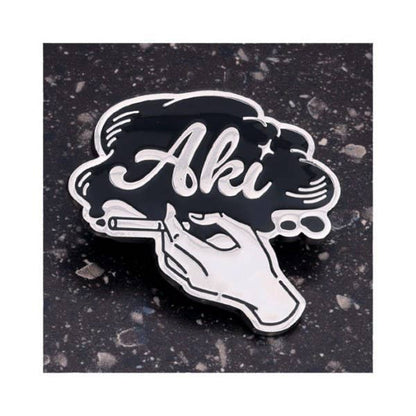 Chainsaw Man Reze Arc Motif Design Pins complete box — 10 black and silver metal pins featuring Denji, Reze, Makima, Aki, Power, Beam, Angel Devil, Chainsaw Man and Bomb
