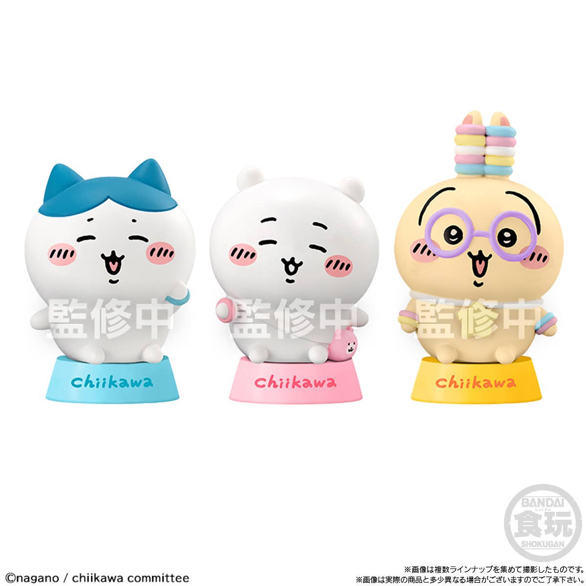 Three colorful figurines with cartoon-like designs on a white background, featuring the brand 'chiikawa'.