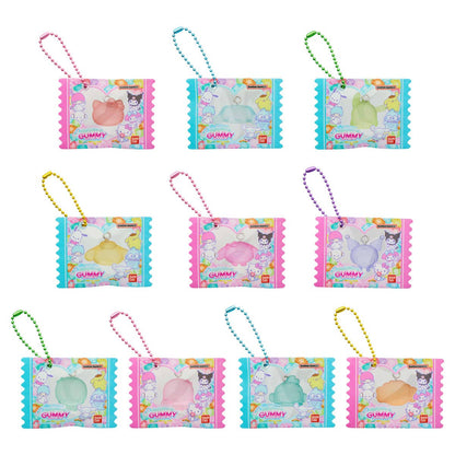Sanrio Gummy Charms full collection featuring Hello Kitty, My Melody, Kuromi, and other cute Sanrio friends. Each charm is shaped like a gummy candy with colorful pastel packaging and matching ball chains for display or bags.