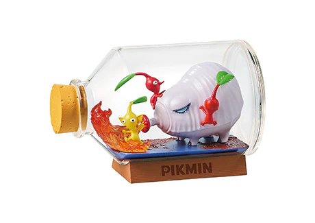 Pikmin figurine in a glass bottle on a white background