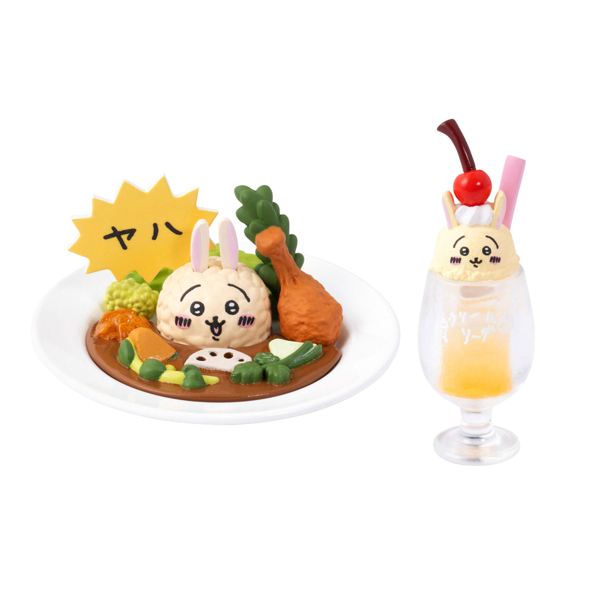 Two cute food-themed figurines on a white background