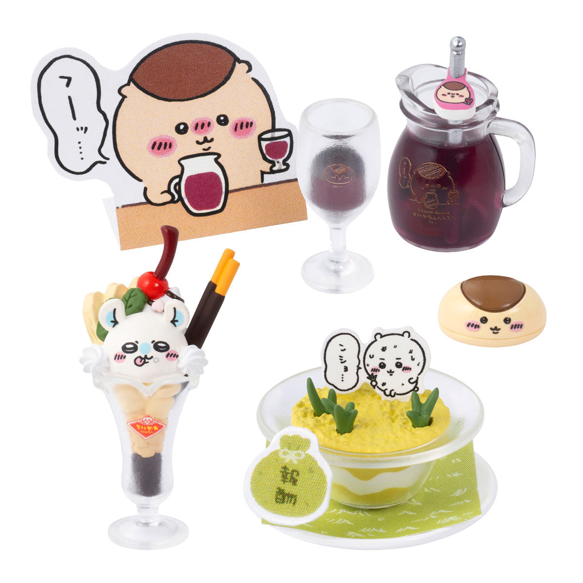 Set of cute food-themed figurines and accessories on a white background