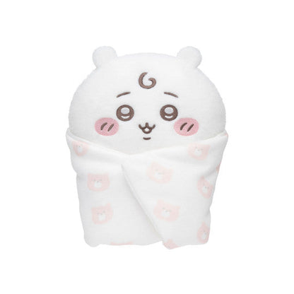 White plush toy with cartoon face on a white background
