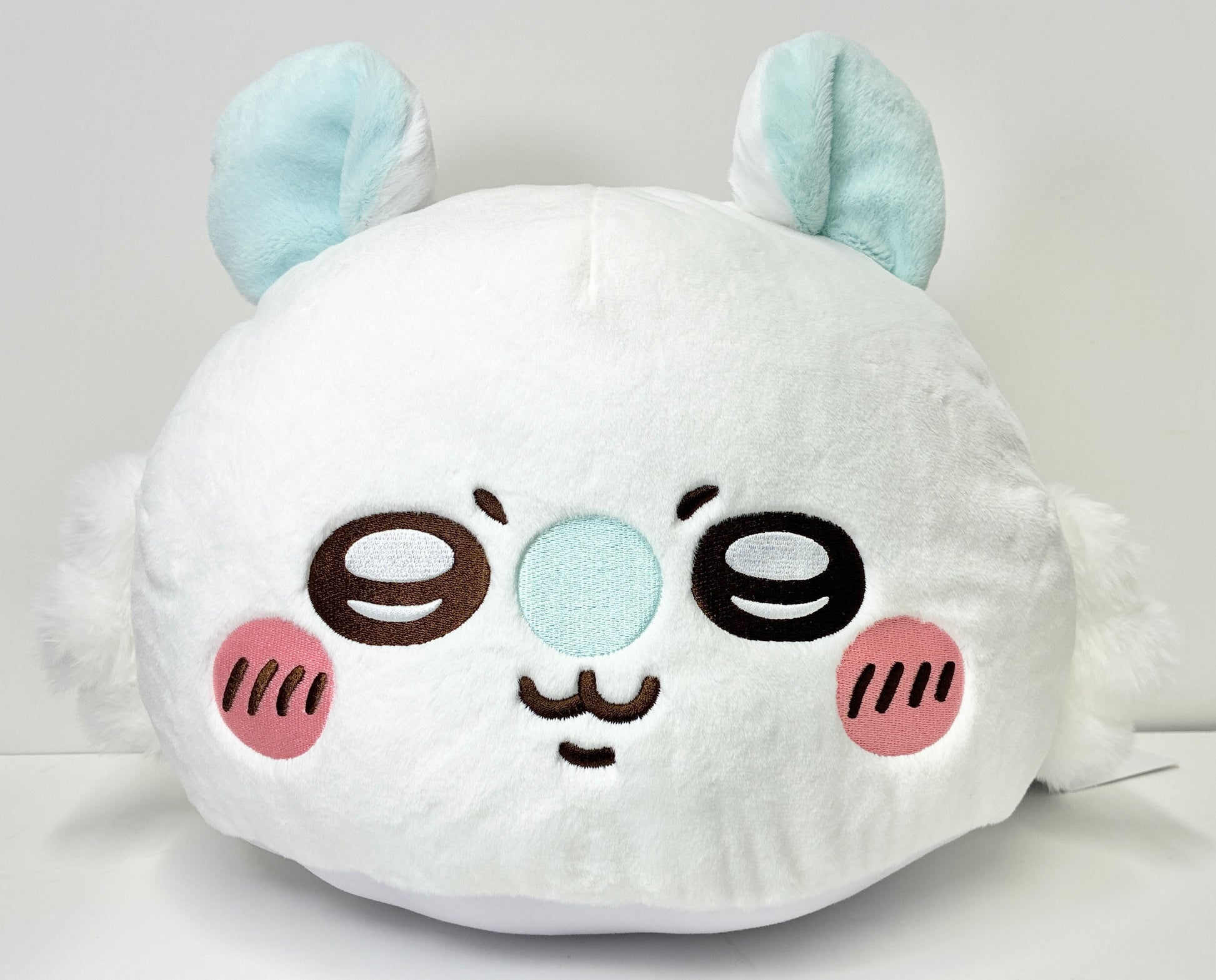 Chiikawa Premium Dome Cushion Momonga — white hemisphere cushion with teal ears and embroidered Momonga face, official Sega Prize collectible