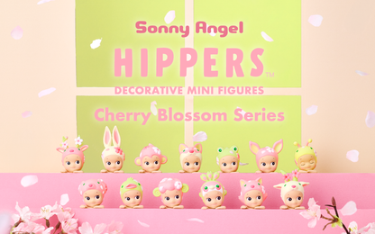 Sonny Angel Hippers Cherry Blossom Series blind box — 12 pink and green sakura-themed decorative mini figures with self-adhesive backing, official spring 2026 collectible