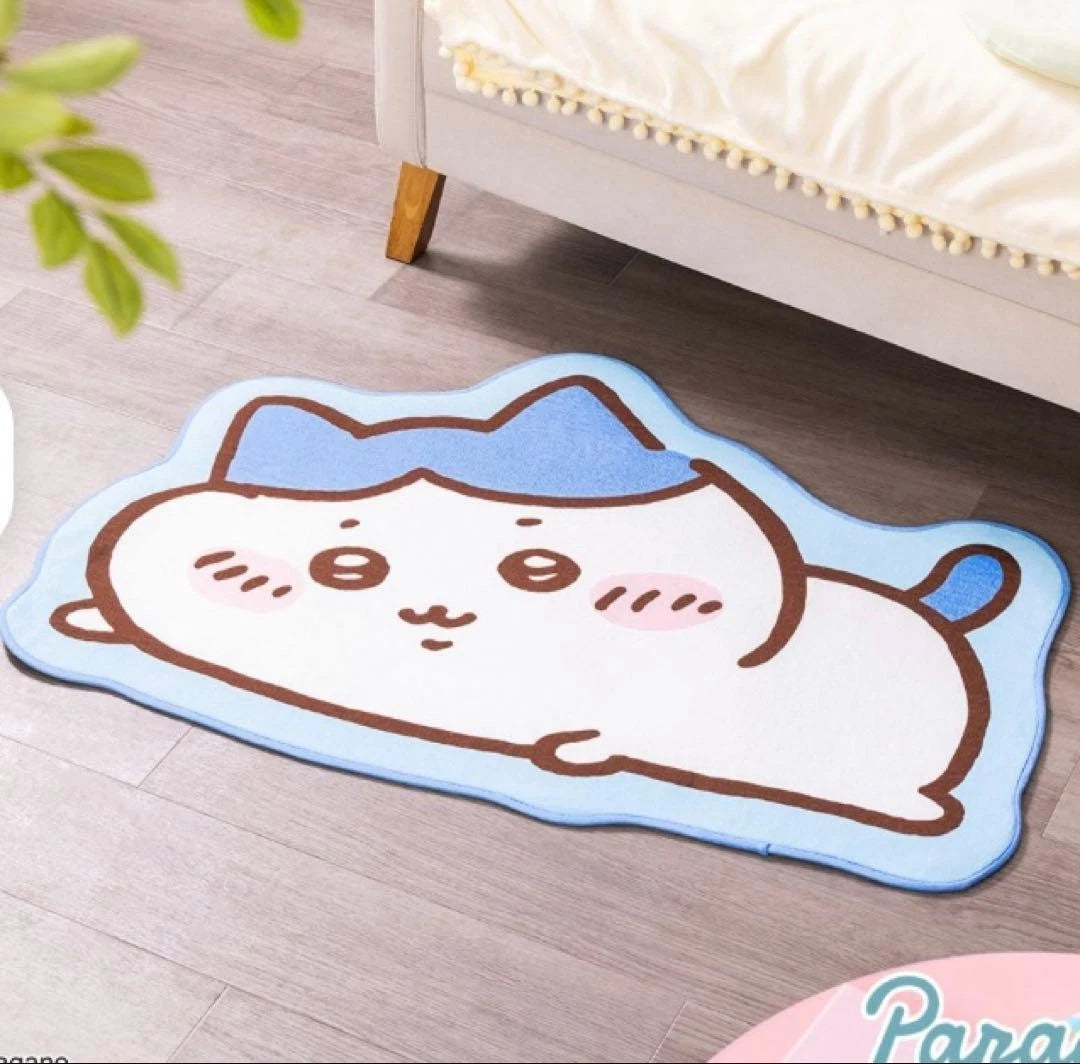 Chiikawa Parade lying down rug mat — 4 designs featuring Chiikawa (pink), Hachiware (blue), Usagi (yellow) and Momonga (purple), approx. 100cm with non-slip backing