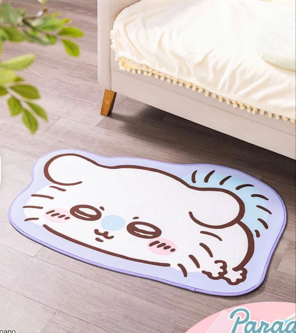 Chiikawa Parade lying down rug mat — 4 designs featuring Chiikawa (pink), Hachiware (blue), Usagi (yellow) and Momonga (purple), approx. 100cm with non-slip backing