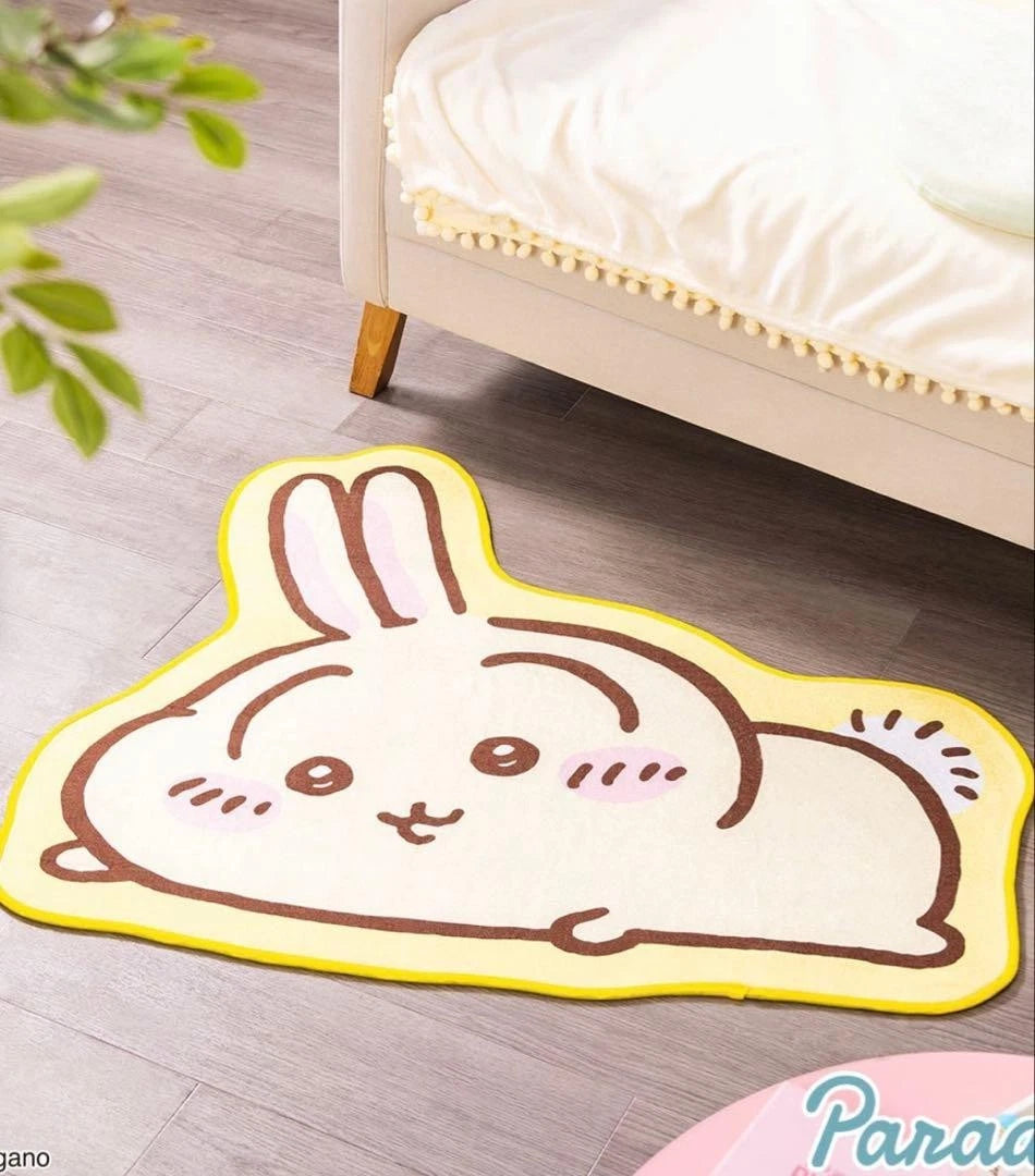 Chiikawa Parade lying down rug mat — 4 designs featuring Chiikawa (pink), Hachiware (blue), Usagi (yellow) and Momonga (purple), approx. 100cm with non-slip backing